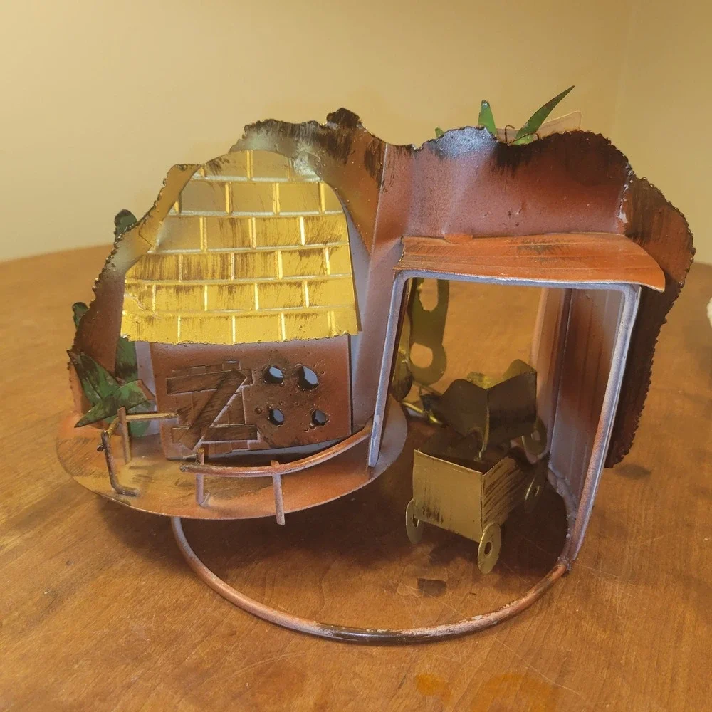 Oxidized Copper Train Moves in Circles - Music Box Works